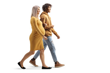 African american man and a caucasian pregnant woman walking together