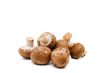 Fresh champignon mushrooms isolated on white.
