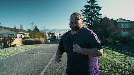 Happy man dancing in street. A cheerful fat chubby guy dancer celebrates life. Funny laid bad person