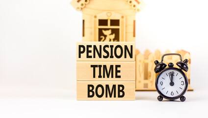 Pension time bomb symbol. Concept words Pension time bomb on wooden blocks on a beautiful white table white background. Black alarm clock, house model. Business pension time bomb concept. Copy space. - obrazy, fototapety, plakaty