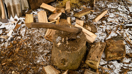 Firewood for the oven. Wood preparation. Chopping wood. Household. Cutting with an axe.
