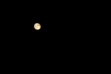Full moon in the black night sky