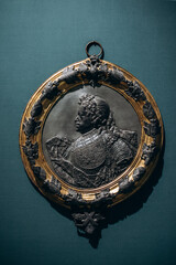 The image of the emperor on a silver plate.