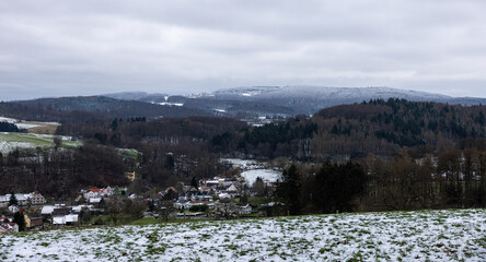 View over the Stettbachtal near Seeheim-Jugenheim in the direction of the Modautal and Lichtenberg Castle in winter with snow