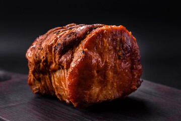 Delicious fresh smoked meat or ham with spices and herbs