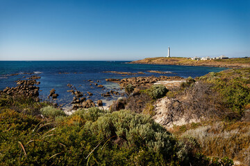 Fototapeta na wymiar Cape Leeuwin Lighthouse located on the headland of Cape Leeuwin, the most south-westerly point on the mainland of the Australian Continent in Western Australia.