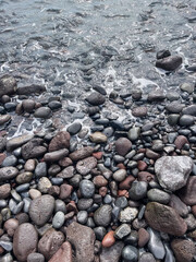 Wet stones by the ocean
