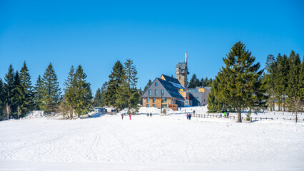 Sunny winter day at Kralovka Lookout and Mountain Hut, located near Bedrichov in the picturesque...