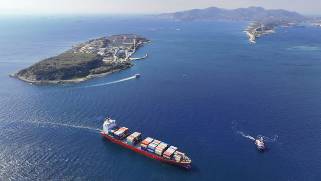 Aerial drone photo of small industrial island of Psitaleia the largest sewage treatment plant in Europe, Saronic gulf, Peiraeus, Attica, Greece