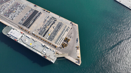 Fototapeta na wymiar Aerial drone top down photo of international car terminal and Ro Ro boat anchored in Keratsini area, Piraeus, Attica, Greece