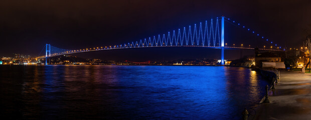 Fototapeta premium Istanbul, Bosphorus and bridges night view. Panoramic long exposure.