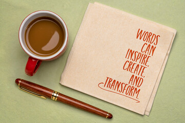Words can inspire, create, and transform. Inspirational handwriting on a napkin, power of words and communication concept.