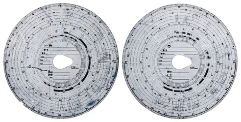 Two tachograph discs with a car driving record on an isolated background.