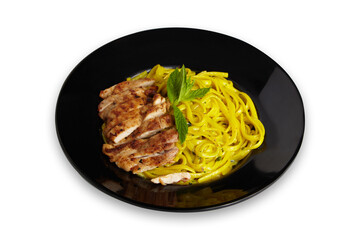 Linguine Pasta With Grilled Chicken on a Black Plate Isolated White Background