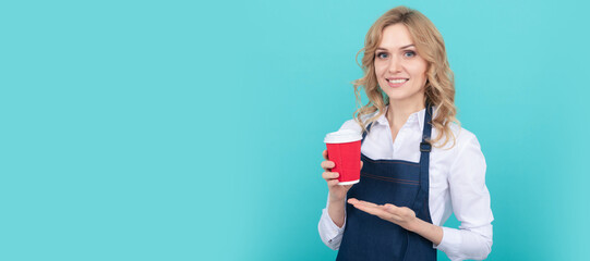 happy woman barista in cook apron drink takeaway coffee, barista. Woman isolated face portrait, banner with mock up copy space.