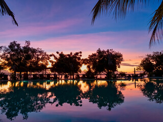 Balinese holiday resort at dusk and sunset.