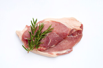 Pork meat with rosemary on white background.