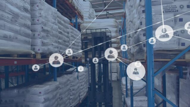 Animation of network of profiles over overhead view of male worker operating forklift at warehouse