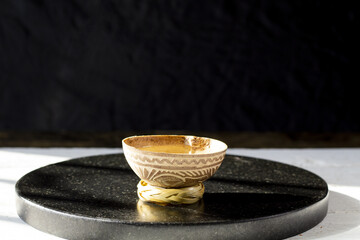 shot of mezcal or tequila in traditional artisan glass
