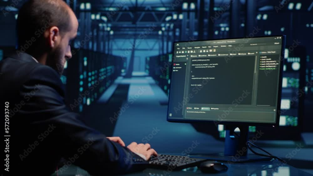 Poster male system engineer analyzing big data on computer, checking cloud computing network and digital se