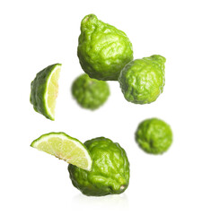 Fresh ripe bergamot fruits falling on white background