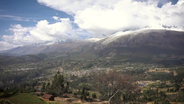 Quietness at valley lands of Peru Yungay Ancash pan right with a view of Huascaran
