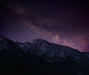 Picturesque view of starry night sky over mountains
