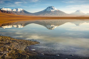 Poster Salt lake Lejia reflection, idyllic volcanic landscape at Sunset, Atacama, Chile © Aide