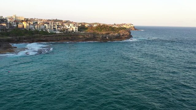 Drone flying towards south Bondi and Marks Park from Bronte, Sydney Australia