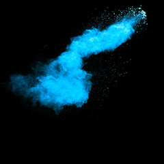 Blue color dust particles explosion cloud on black background.Color powder splash.
