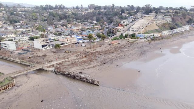Storm Surge Damage Along The Stretch Of Rio Del Mar Beach. Storm Aftermath In Seacliff State Beach, Aptos, California. aerial orbit