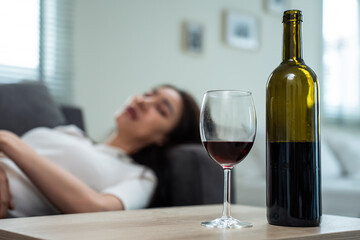 Asian young depression woman feeling heart broken and drinking alcohol