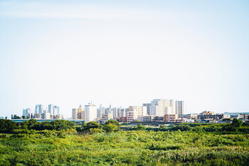 Fototapeta na wymiar 水平線と街　landscape with city