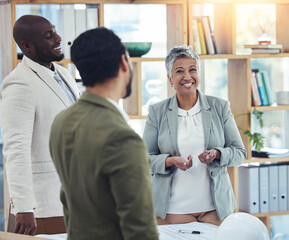 Obraz premium Business people, senior woman and meeting with men, smile and happiness for agreement at negotiation. Black man, businessman and manager in funny chat, teamwork and friends for diversity in workplace