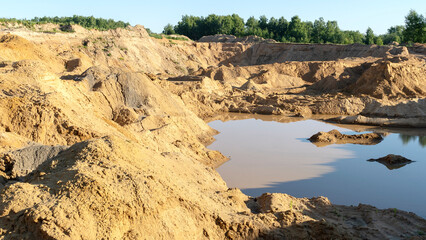 Fototapeta na wymiar quarry for sand extraction on a sunny day