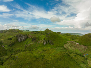 Aerial drone of mountains and green hills among clouds and fog. Osmena Peak. Mountain landscape. Cebu Philippines.