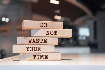 Wooden blocks with words 'Do not waste your time'.
