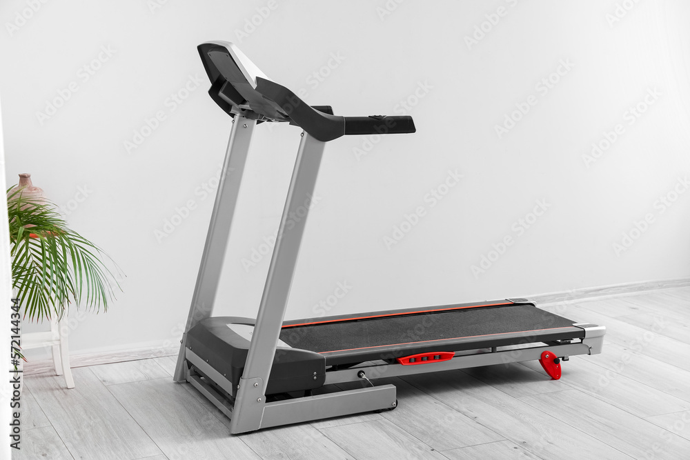 Wall mural Modern treadmill in light room