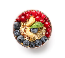 Glass of delicious chocolate pudding with fresh berries, cashew and mint isolated on white background