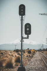 train signal with mountain in the background