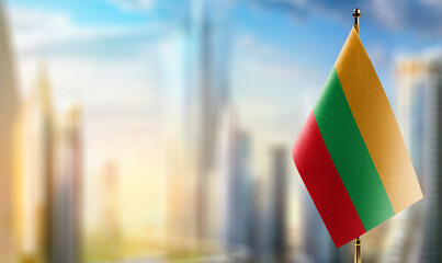 A small Lithuania flag on an abstract blurry background