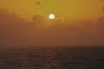 Breathtaking sunrise sunset twilight blue hour dusk dawn cloud horizon nature landscape scenery at sea seen from cruiseship cruise ship liner panorama during cruising