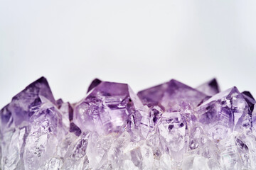 Macro photo of lilac amethyst crystals background