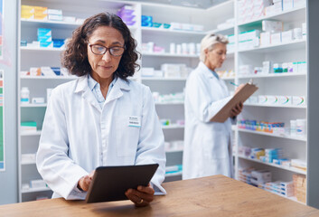 Senior woman, tablet and pharmacist in pharmacy for healthcare, telehealth or stock check. Medicine...
