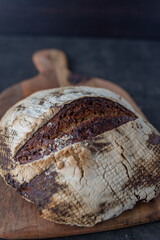 Home made whole grain bread on rustic wooden
