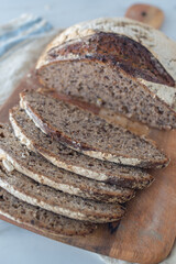 Home made whole grain bread on rustic wooden