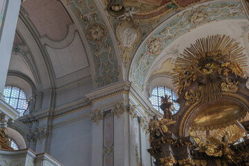 Magnificent opulent splendid Bavarian baroque church cathedral basilica interiors with stucco,...