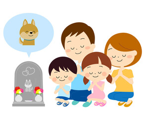 ペットのお墓参りをする家族（春夏）