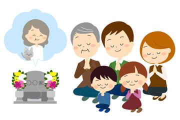 おばあさんとペットのお墓参りをする家族（秋冬）