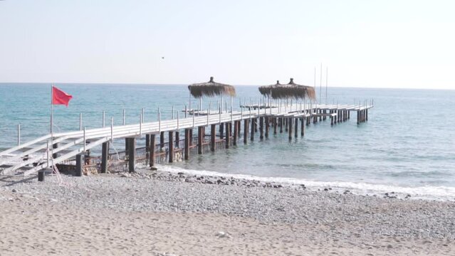 Dismantled pier on the sea in Turkey in the non-tourist season in winter